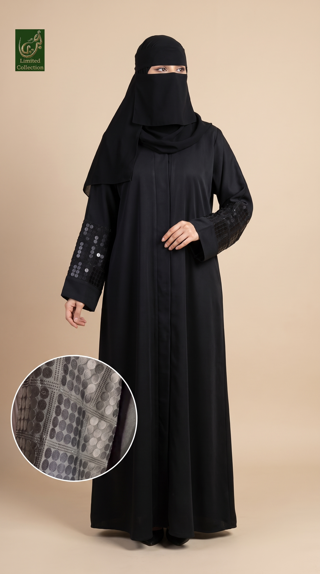 A embroidered stone studded cuff abaya is worn by a woman with a beige backdrop.