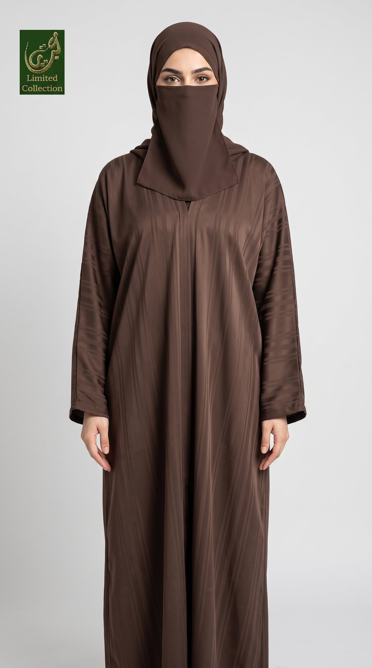 A woman wearing a brown abaya and matching hijab stands against a light gray studio background. A small 'Limited Collection' logo appears in the top-left corner.