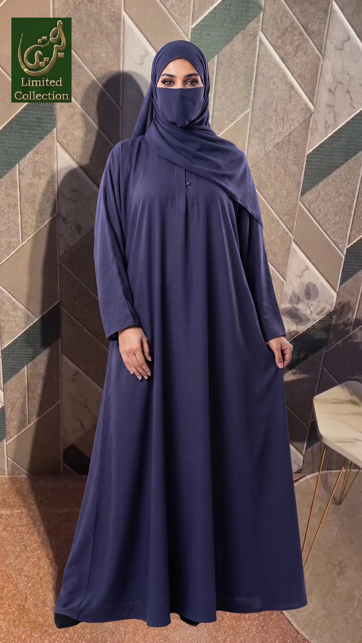 A woman wearing a long navy abaya with a matching hijab and face veil, standing in front of a geometric tiled wall. A logo for 'Adele Limited Collection' is visible in the top left corner.
