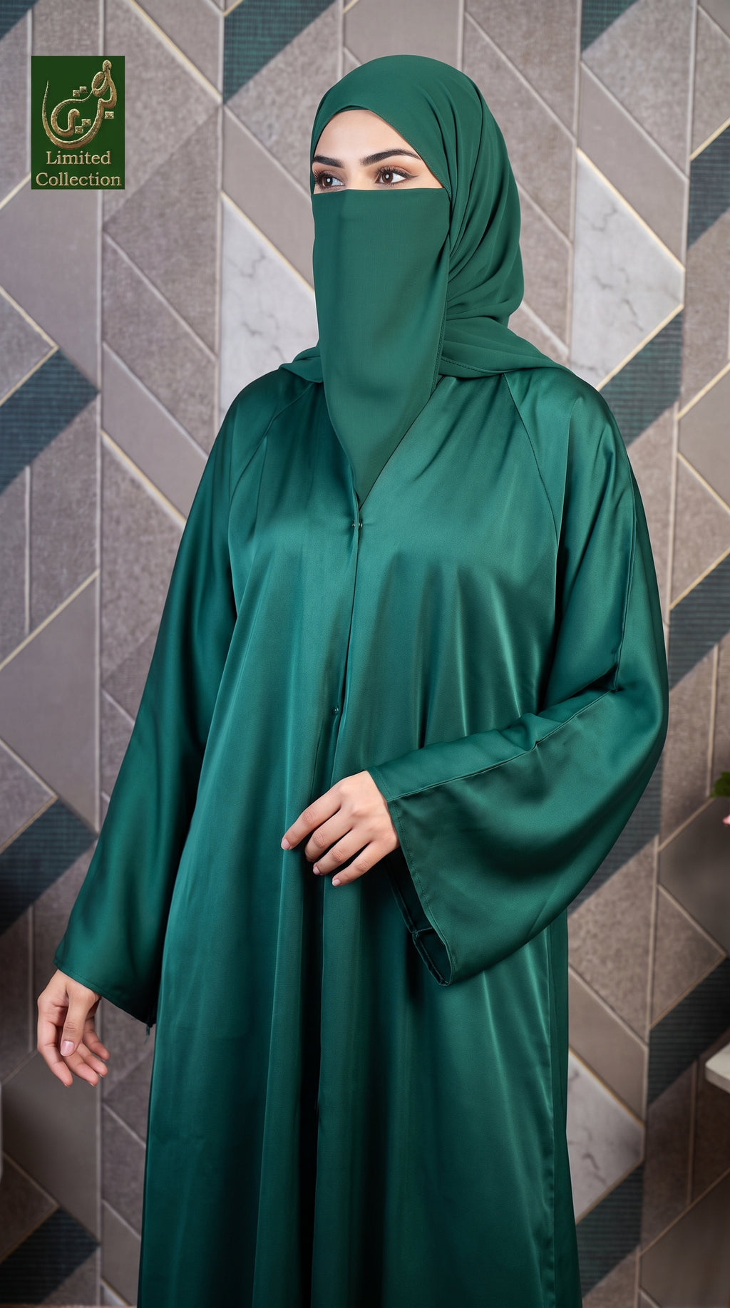 A woman wearing a dark green romantic nida shiny abaya and matching hijab, standing against a geometric tiled wall. A 'Limited Collection' logo is visible in the top-left corner.