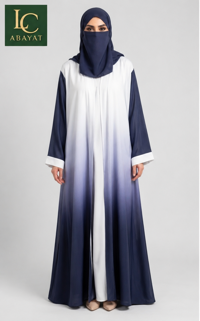 A woman modeling a front-open gradient pastel Ombre long abaya with a navy blue to white ombré gradient, paired with a matching navy blue hijab. The brand logo 'LC ABAYAT' is visible in the top-left corner against a light gray studio background.