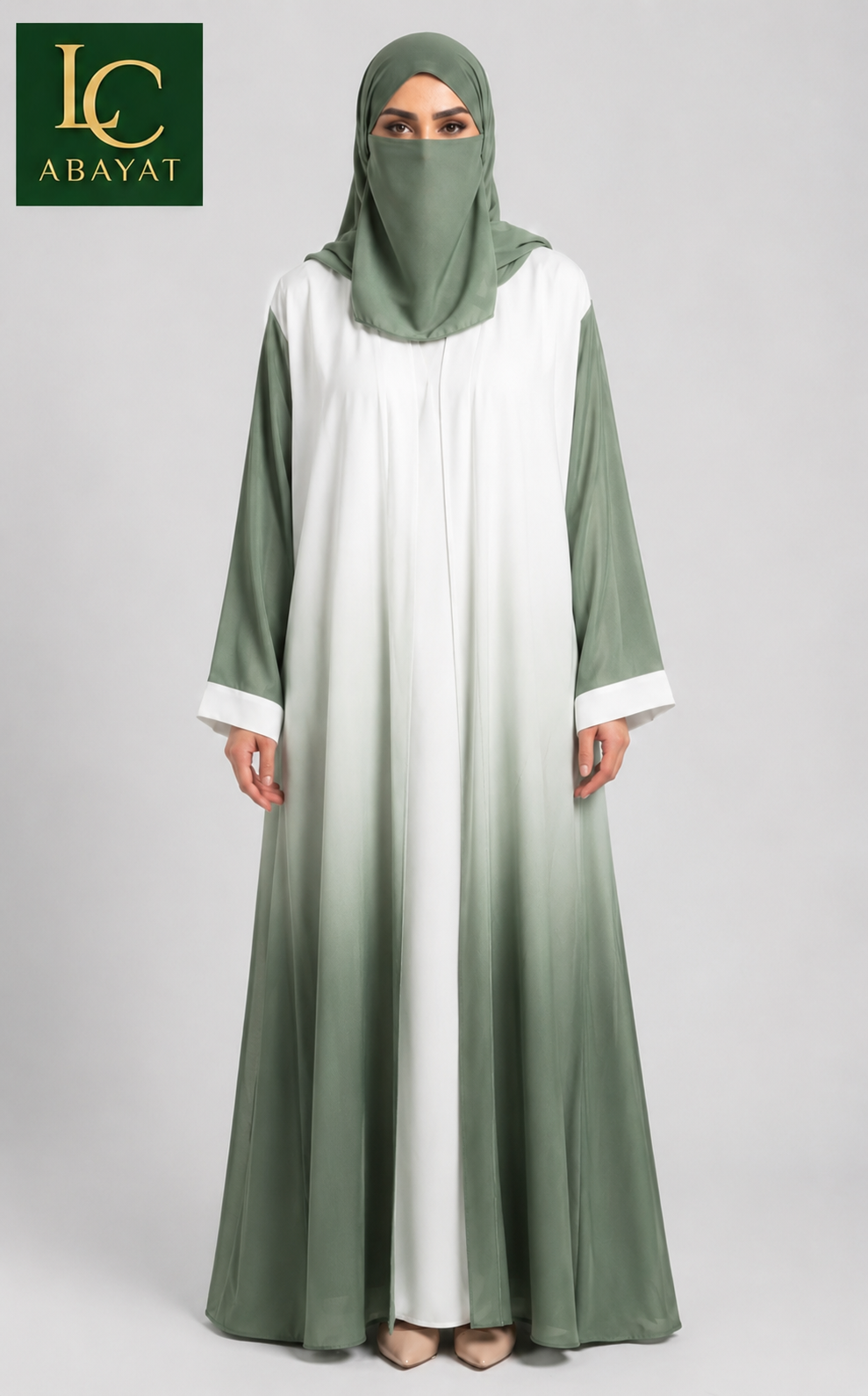 A woman wearing a long front-open 2 shaded beautiful abaya with a sage green and white ombré design, paired with a matching green hijab. The abaya features a wide white yoke at the chest and sleeves, fading into sage green at the hem.