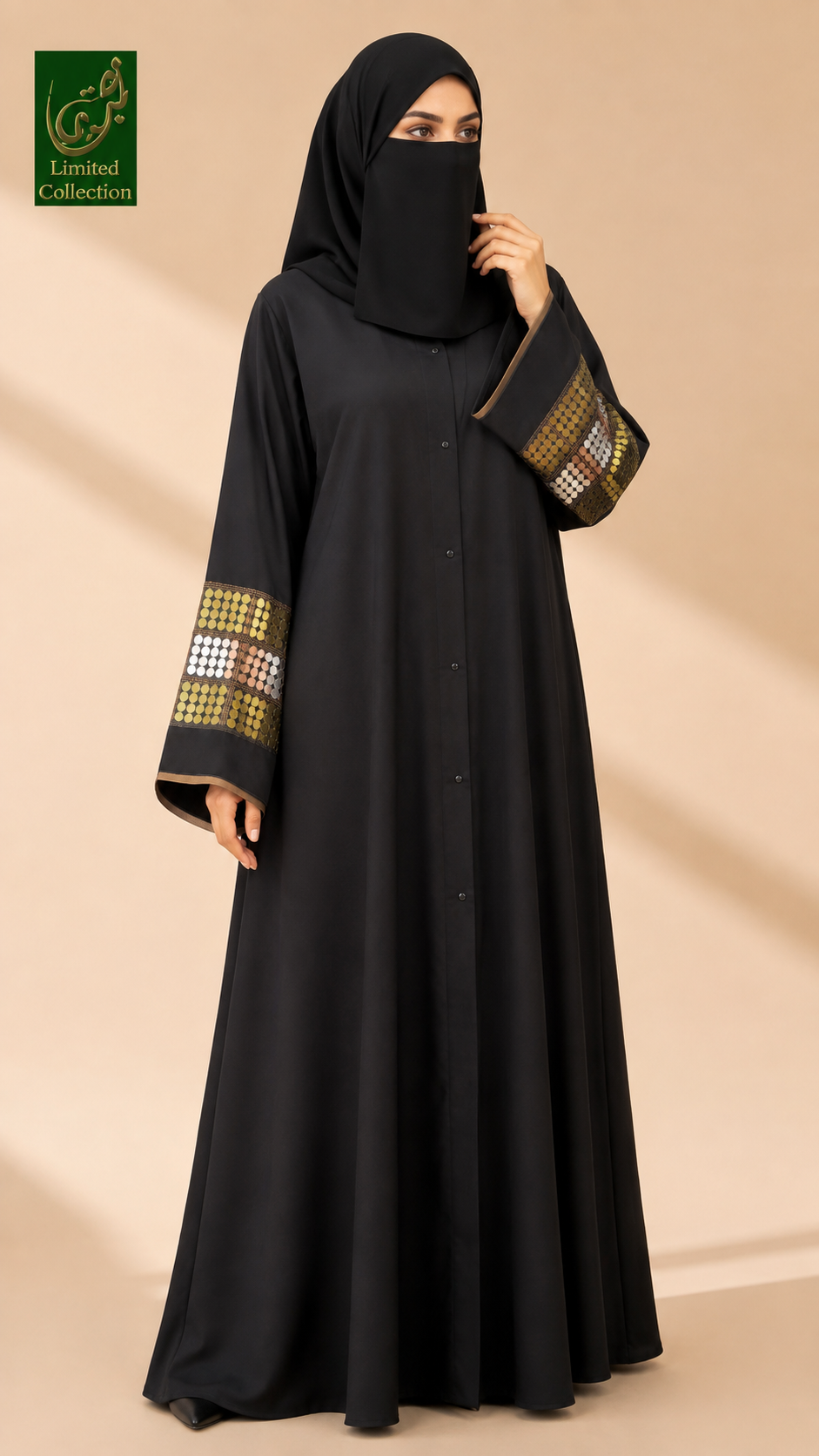 This is another variant of stone studded cuff abaya worn by a woman. The sleeves stonework is in 3 colors. 