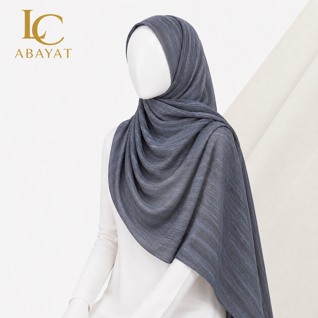 A mannequin wearing a beautiful silver grey hijab.