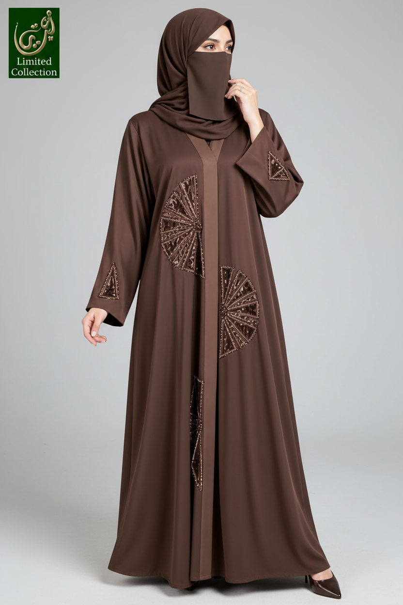 a woman is seen wearing a beautiful brown tissue  cutwork handmade abaya.