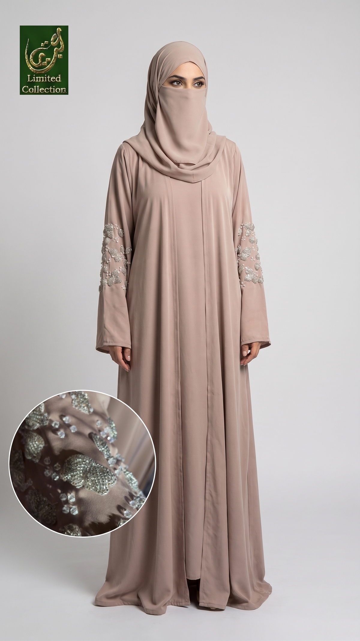 A woman modeling a modest long abaya and matching hijab in a dusty blush pink color, featuring silver and white beaded embroidery on the sleeves. A circular inset shows a close-up of the beaded sleeve detail.